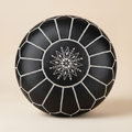 Authentic Moroccan Leather Pouf in Classic Black with hand-stitched geometric embroidery